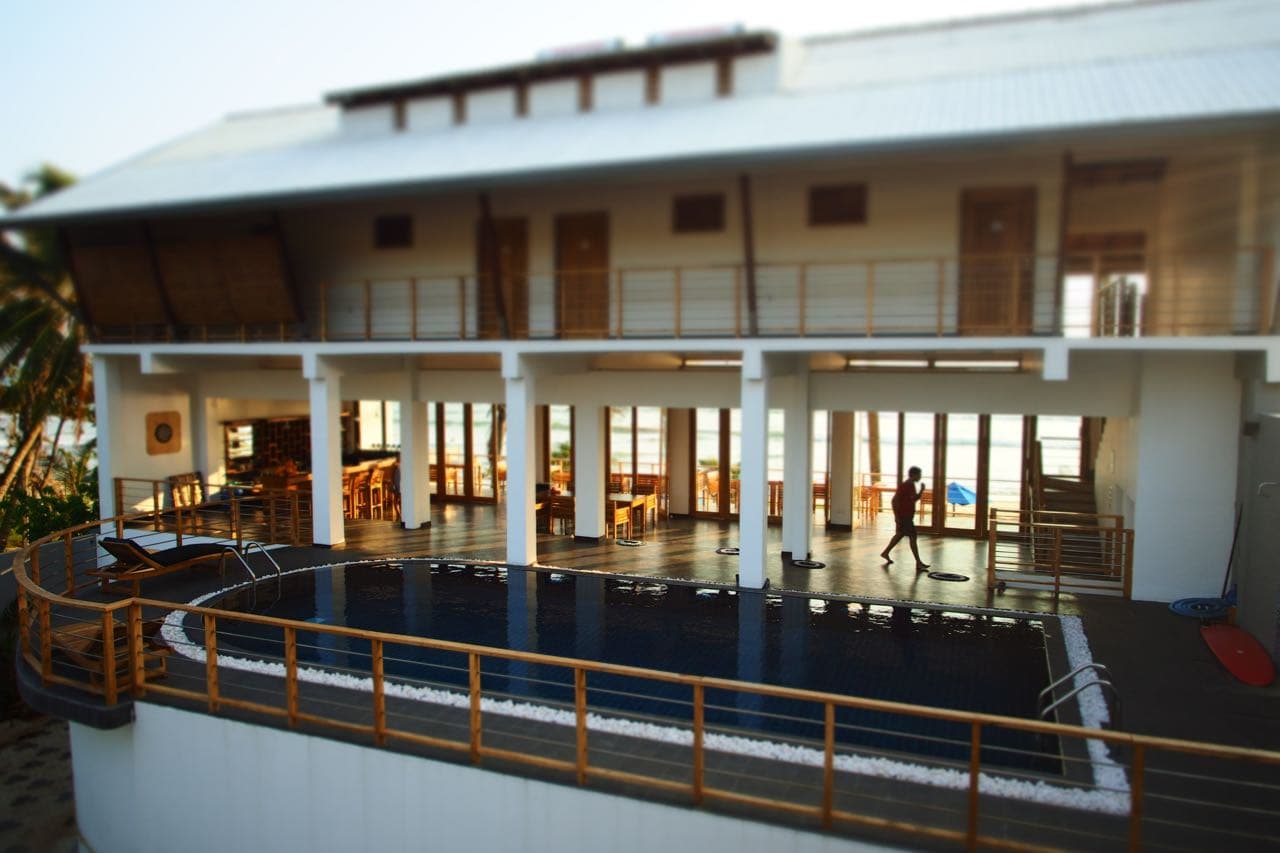 Hotel exterior with the pool in the foreground