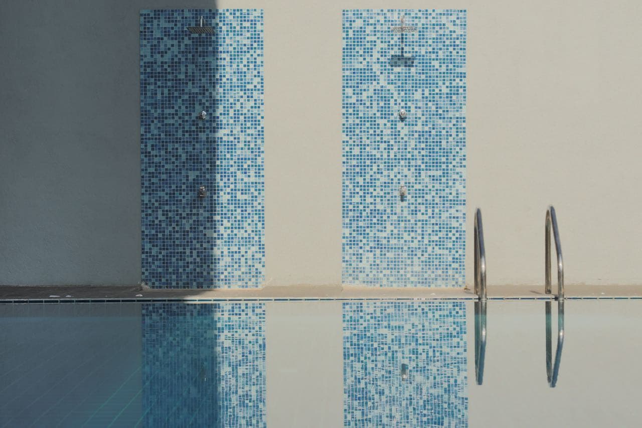 Blue mosaic tile detail in the swimming pool